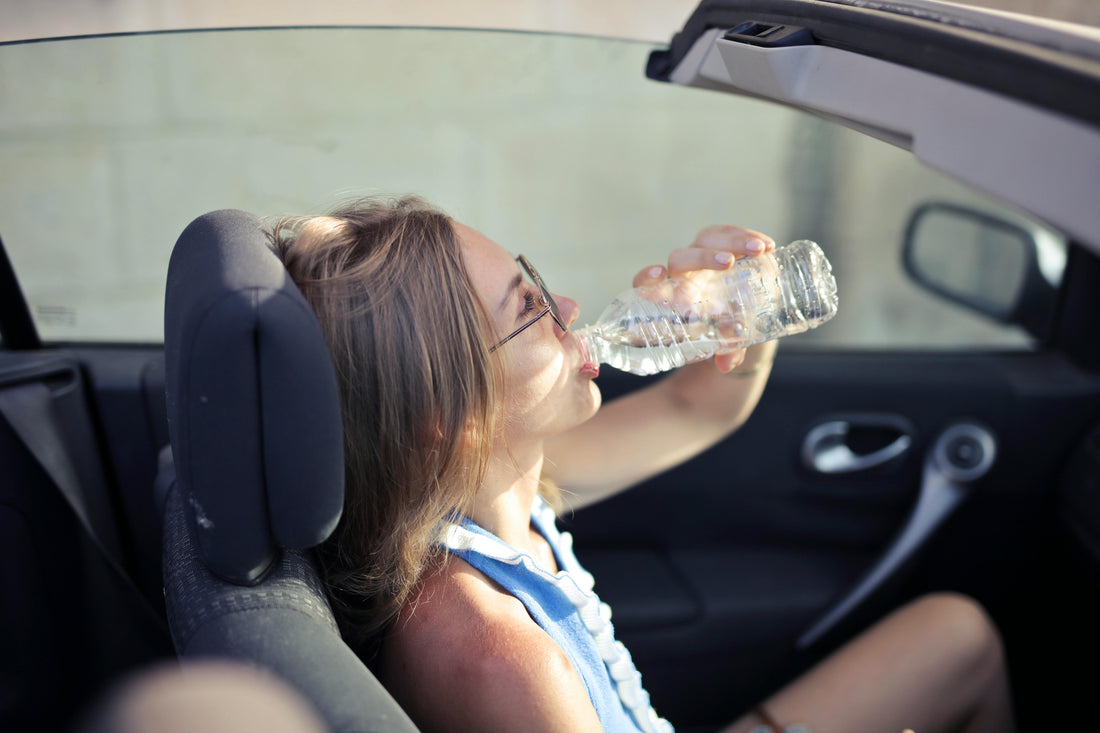 Woman in car heat